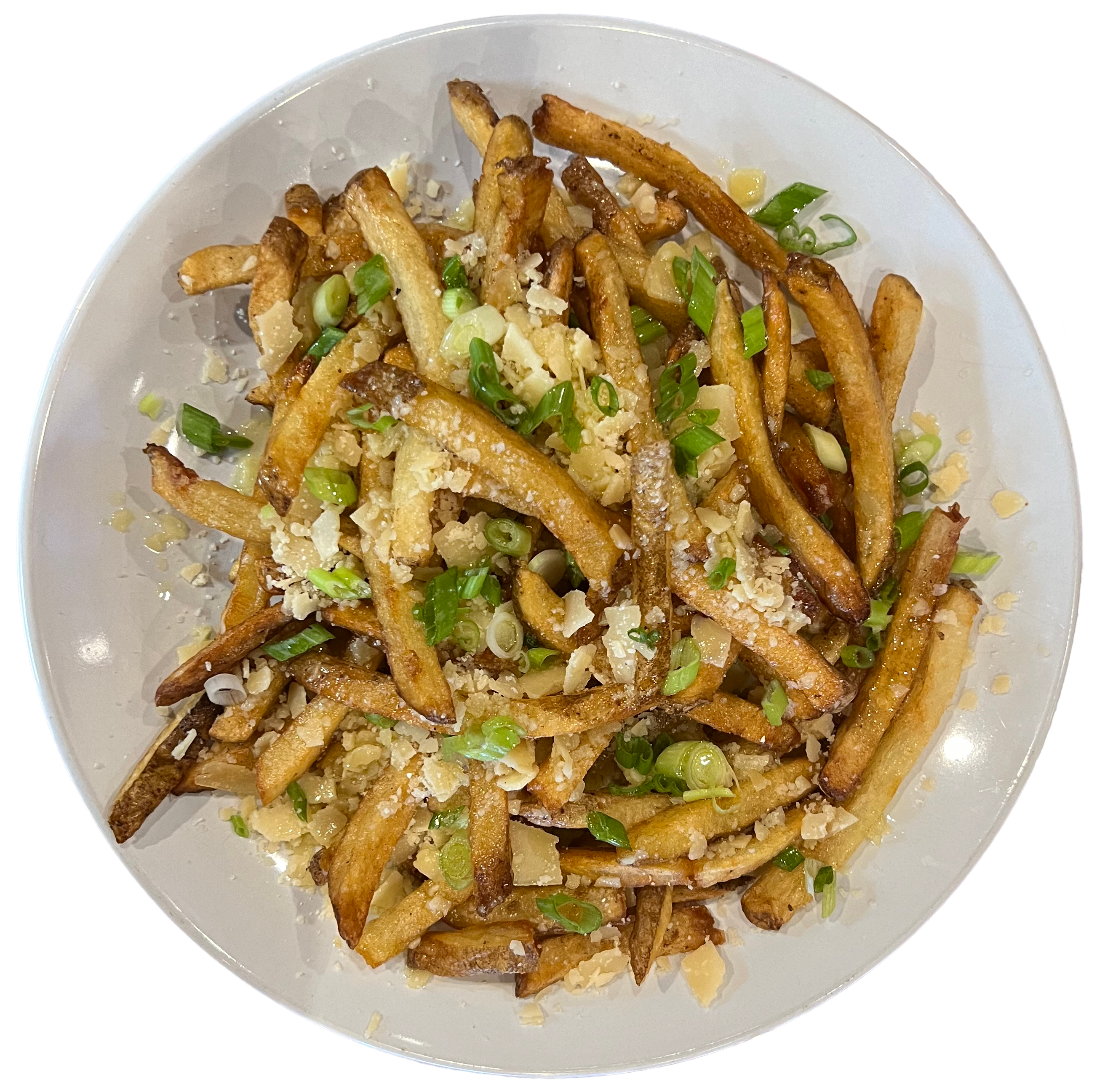 A plate of seasoned French fries topped with grated cheese and chopped green onions.